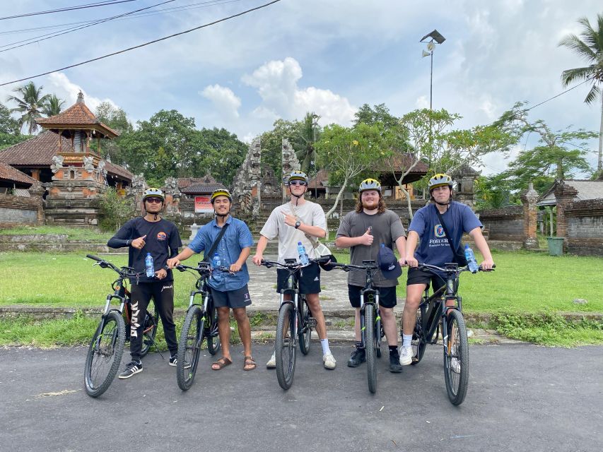 Ubud: Private Bike Tour With Rice Field, Volcano, Meal, Pool - Scenic Highlights and Downhill Cycling