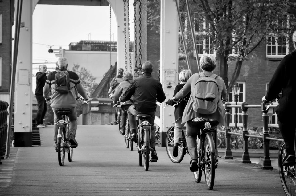 Amsterdam: Sightseeing Bike Tour With a French Guide - Learn About Dutch Architecture and History