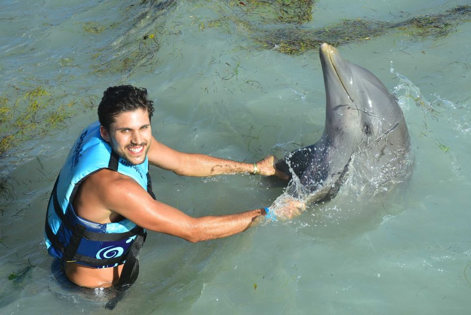 Cancun: Dolphin Swim and Garrafon Reef Park Tour With Buffet - Booking Flexibility