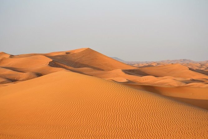 Desert Safari With Sand Boarding Tour From Dubai - Common questions