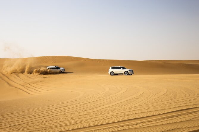 Doha Golden Dune Safari Dune Bashing Sandboarding Inland Sea - Pricing and Cancellation Policy