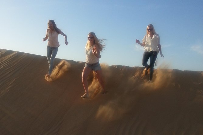 Dubai Desert Afternoon Quad Safari With Camel Ride, BBQ Dinner and Belly Dancing - Cancellation Policy