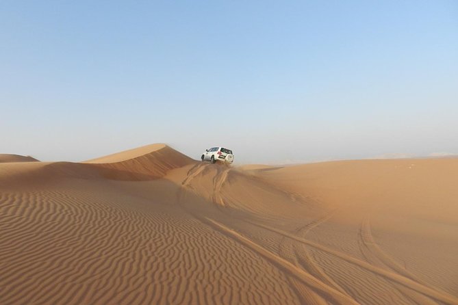 Dubai Desert Safari With Camels, Quadbike, Sandboarding & BBQ - Directions