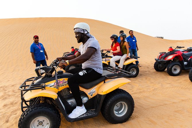 Dubai Desert Safari With Quads, BBQ Dinner, Camel Ride, & Shows - Tour Guide Experience