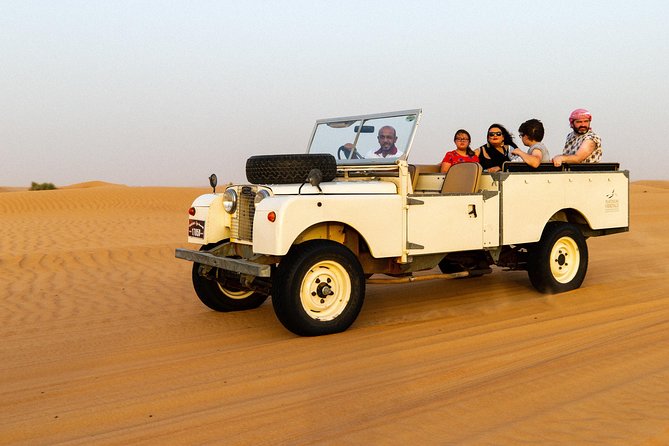 Dubai Heritage Land Rover Desert Safari With Traditional Dinner - Pickup and Transportation