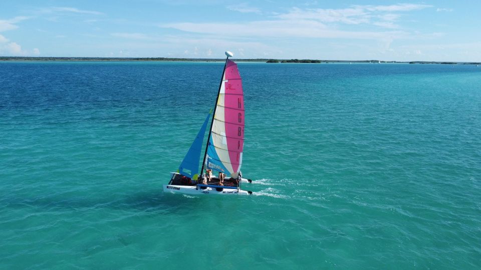 Explore Bacalar With the Wind." - Dive Into Bacalar Lagoon Exploration