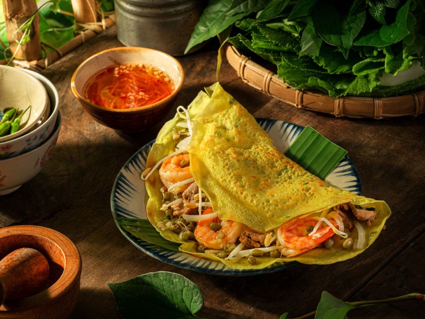 Ho Chi Minh: Eats After Dark Adventure Night Food Tour - Street Food Exploration