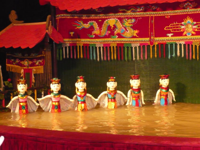 Private Evening Cyclo Tour With Water Puppet Show - Experience Highlights