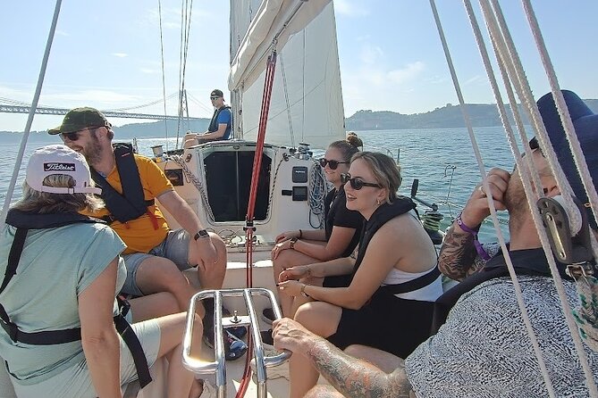 Private Lisbon Sailboat Tour With Welcome Drink - Traveler Engagement
