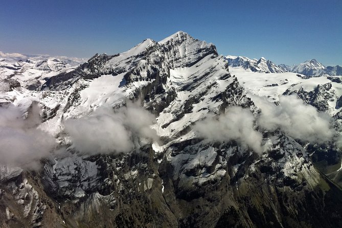 Private Swiss Alps Helicopter Tour Over Snow Covered Mountain Peaks and Glaciers - Cancellation Policy