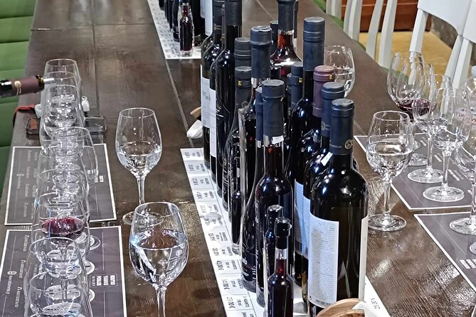 Private Wine Visit in Fira With 12 Wine Tastings and Tapas - Group Size Pricing