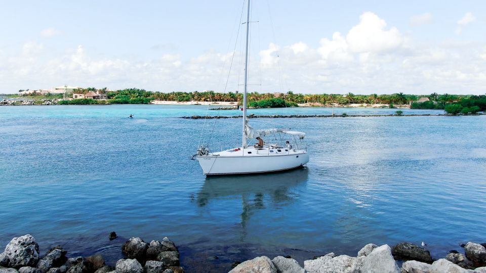 Puerto Aventuras: Private Sunset Sailing Tour - Highlights