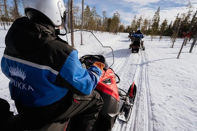 Snowmobiling and Ice Fishing in Apukka Resort, Rovaniemi - Winter Clothing Provided