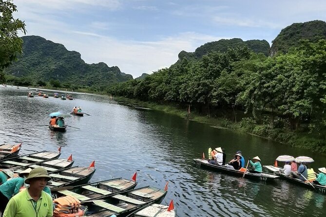 Trang an Grottoes - Bai Dinh Pagoda Day Tours - Boat Ride Experience