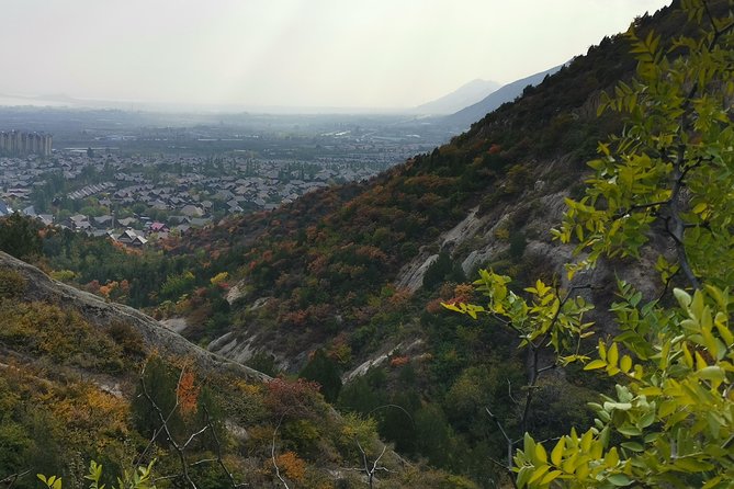 Unrestored Ancient Badaling Great Wall & Guyaju Dwelling Day Tour - Common questions