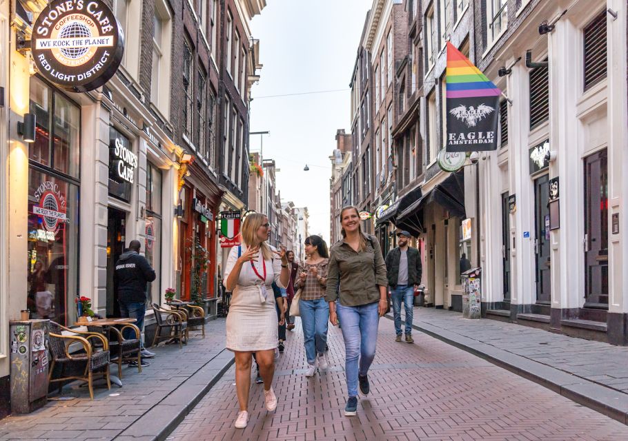 Amsterdam: Red Light District Tour in German or English - Meeting Point and Guide Information