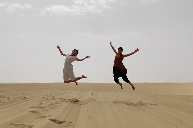 Desert Safari With Sandboarding and Inland Sea Private Tour - Sandboarding Experience