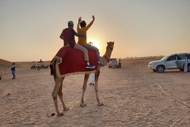 Dubai: Desert Safari 4x4 Dune With Camel Riding and Sandboarding - Immerse Yourself in Cultural Entertainment