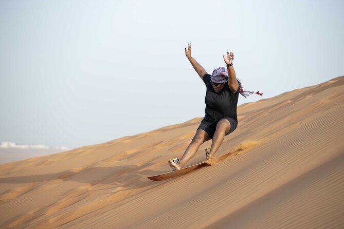 Dubai Half-Day Red Dunes Bashing With Sandboarding, Camel &Falcon - Booking Assistance
