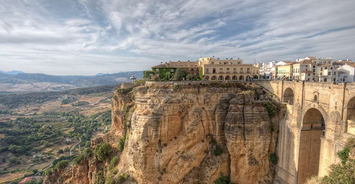 From Seville: Private Transfer to Granada With Tour of Ronda - Location and Attractions