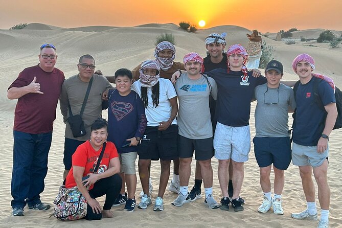 Guided Desert Safari With Dinner and Quad Biking in Dubai - Cancellation Policy and Reviews