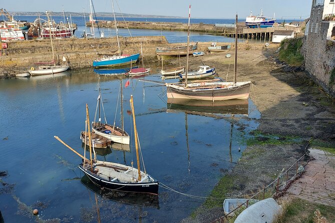 Guided Heritage Walking Tour in Newlyn - Historical Visuals Presentation