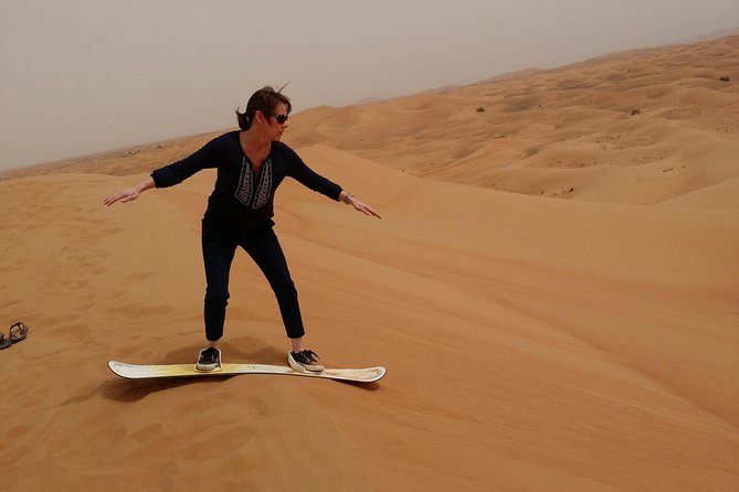 Private Desert Safari With Sand Boarding Quad Bike and Camel Ride BBQ Dinner - Booking & Cancellation Policy