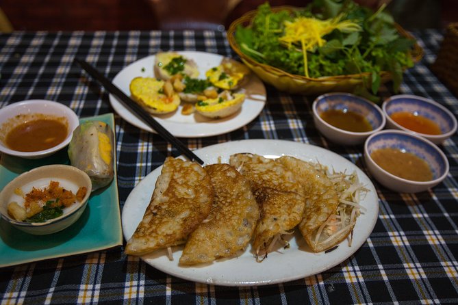 Saigon Night Street Food and City Tour on Scooter - Guide Expertise