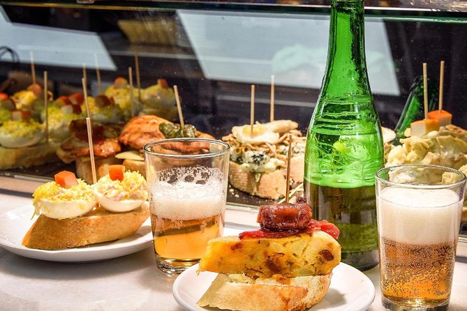 Wine and Tapas in Madrid : 2.5 Hour Exclusive Tour - Booking Confirmation and Accessibility