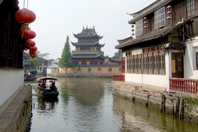 Zhujiajiao Water Village & Seven Treasure Town Day Tour From Shanghai - Round-Trip Transportation Details