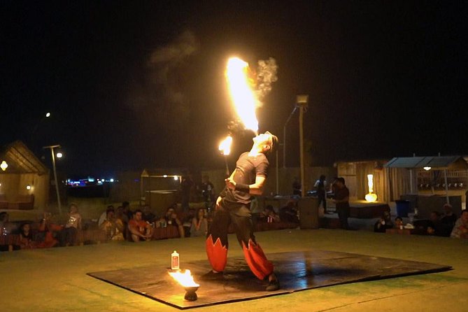 30-Mins Quad Bike Desert Safari ,BBQ Dinner, Fire Show, Belly Dance, Tanura Show - Entertaining Tanura Show Description