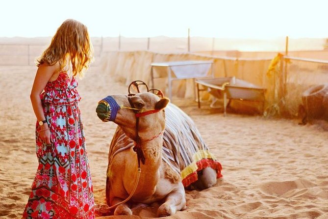 Arabian Desert Safari With BBQ Dinner Camel Ride, Sand Boarding - Explore Traditional Bedouin Activities