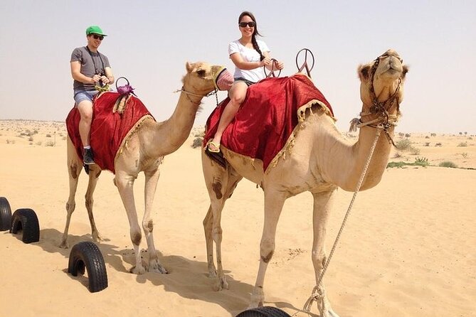 Dubai Red Dune Bash, Camel Ride, Sand Boarding, and BBQ Dinner - Common questions