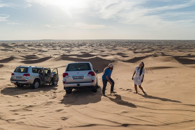 Dubai Red Dune Desert Safari: Camel Ride, Sandboarding & BBQ Options - VIP Treatment