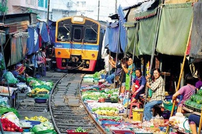 Floating Market Damnoen Saduak and Meklong Railway Market: Half Day Tour - Reviews and Recommendations
