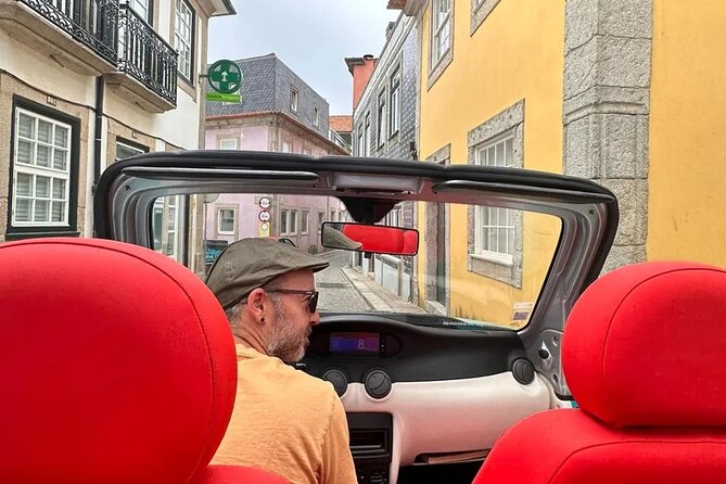 Porto Discovering the Undefeated City Tuk Tuk Tour - Guide Ricardos Expertise and Service