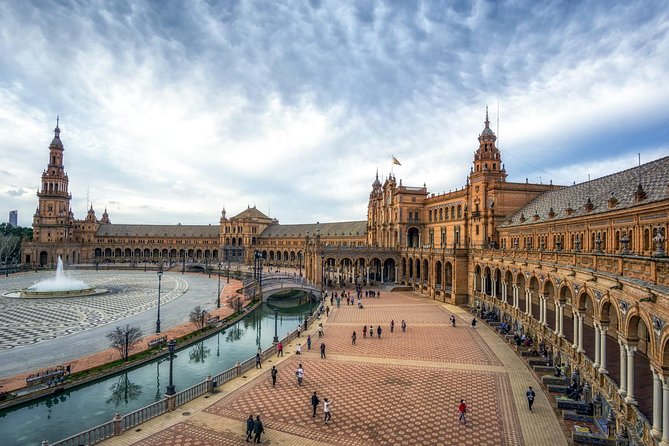 Seville One Day Trip From Granada, Alcazar, Cathedral and Giralda Guided Tour. - Common questions