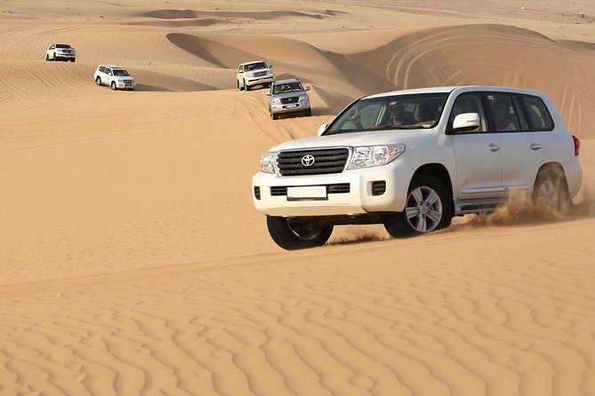 Dubai Desert Safari With Buffet Dinner, Sand Boarding & Shows - Traditional Bedouin Camp Experience