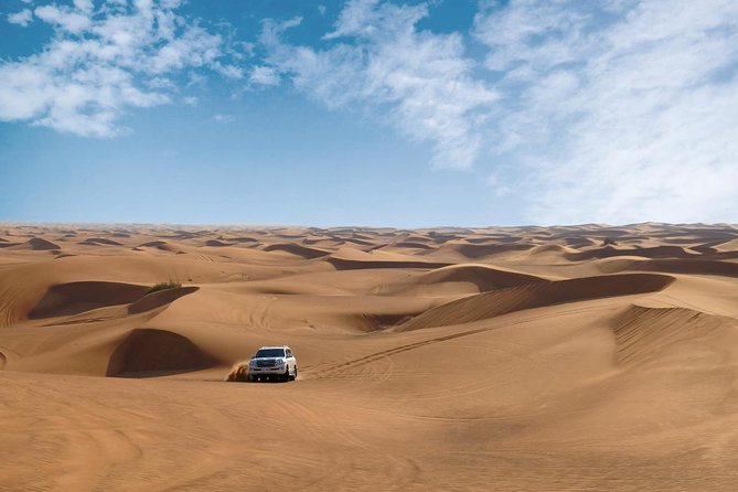 Dubai Desert Safari With Dune Bashing, Camel Rides & BBQ