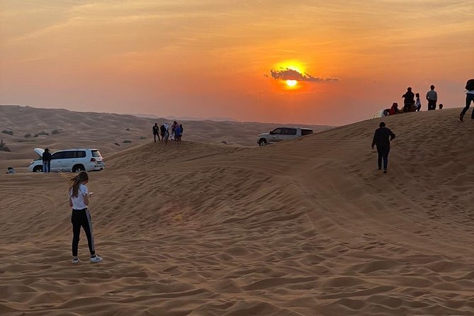Dubai Evening Desert Safari With ATV Quad Bike & Dinner - Cancellation Policy and Traveler Reviews