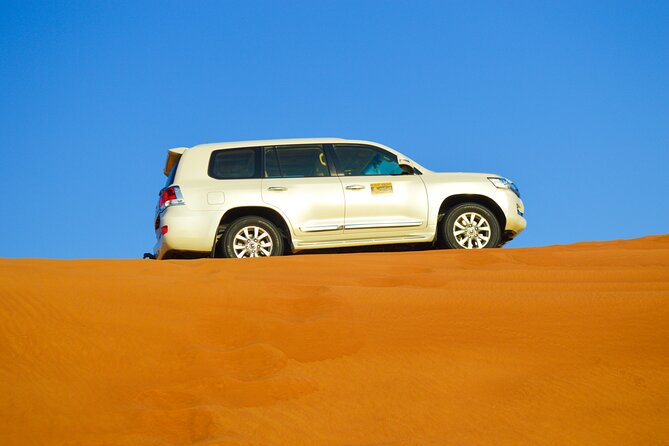 Evening Desert Safari With Quad Bike, BBQ Dinner and Camel Ride - Essential Details for the Activity