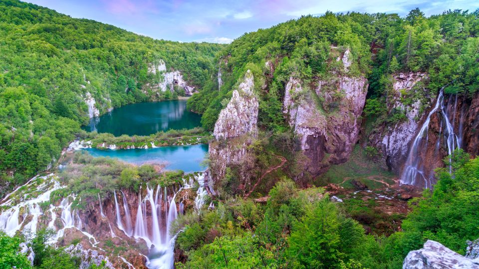 From Split and Trogir: Plitvice Lakes Economy Group Tour - Key Tour Highlights