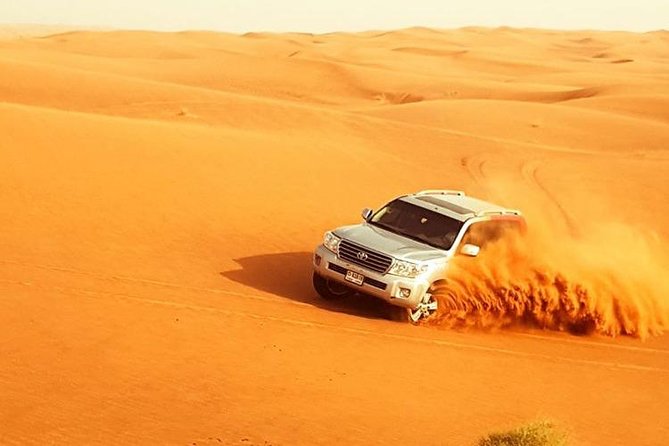 Red Dune Desert Safari Dubai With BBQ Buffet Dinner - Dubai Travelism - Cancellation Policy