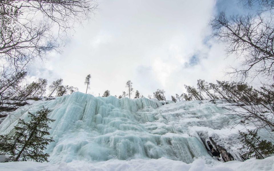 Rovaniemi: Korouoma Canyon and Frozen Waterfalls Tour - Campfire Snacks and Finnish Traditions