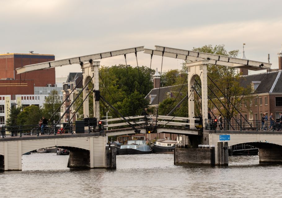 Amsterdam: Canal Cruise in German With Unlimited Drinks - Meeting Point and Weather