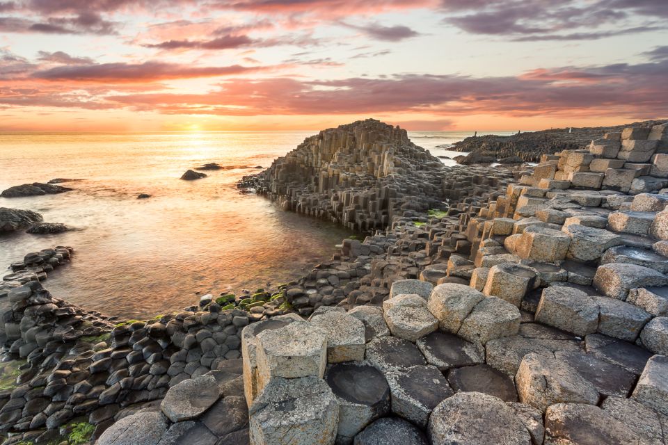 Dublin: Giant's Causeway, Dark Hedges & Titanic Guided Tour - Dunluce Castle Exploration