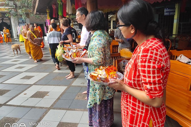 Morning Alms to Monks, Doi Suthep Temple, Hidden Temple & Chiang Mai City Views. - Common questions
