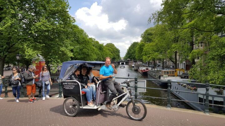 Amsterdam 1-Hour Rickshaw Tour - Key Points