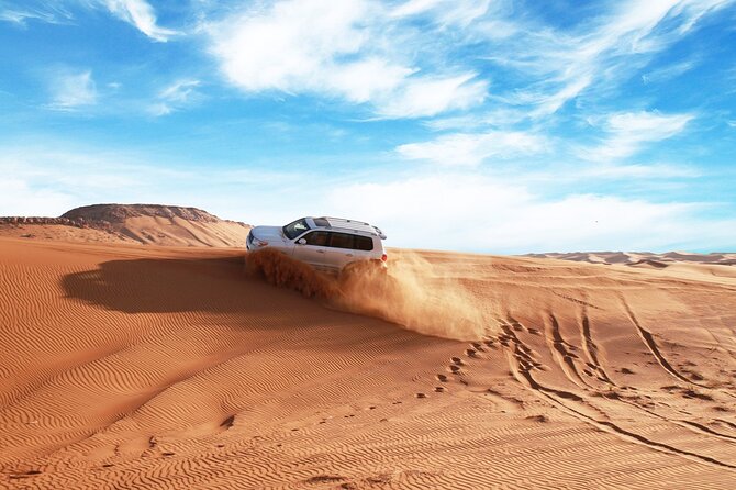 Desert Safari in 4x4 Car With BBQ Dinner and Belly Dance - Key Points