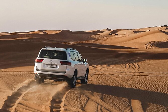 Dubai: Desert Safari 4x4 Dune With Camel Riding and Sandboarding - Key Points